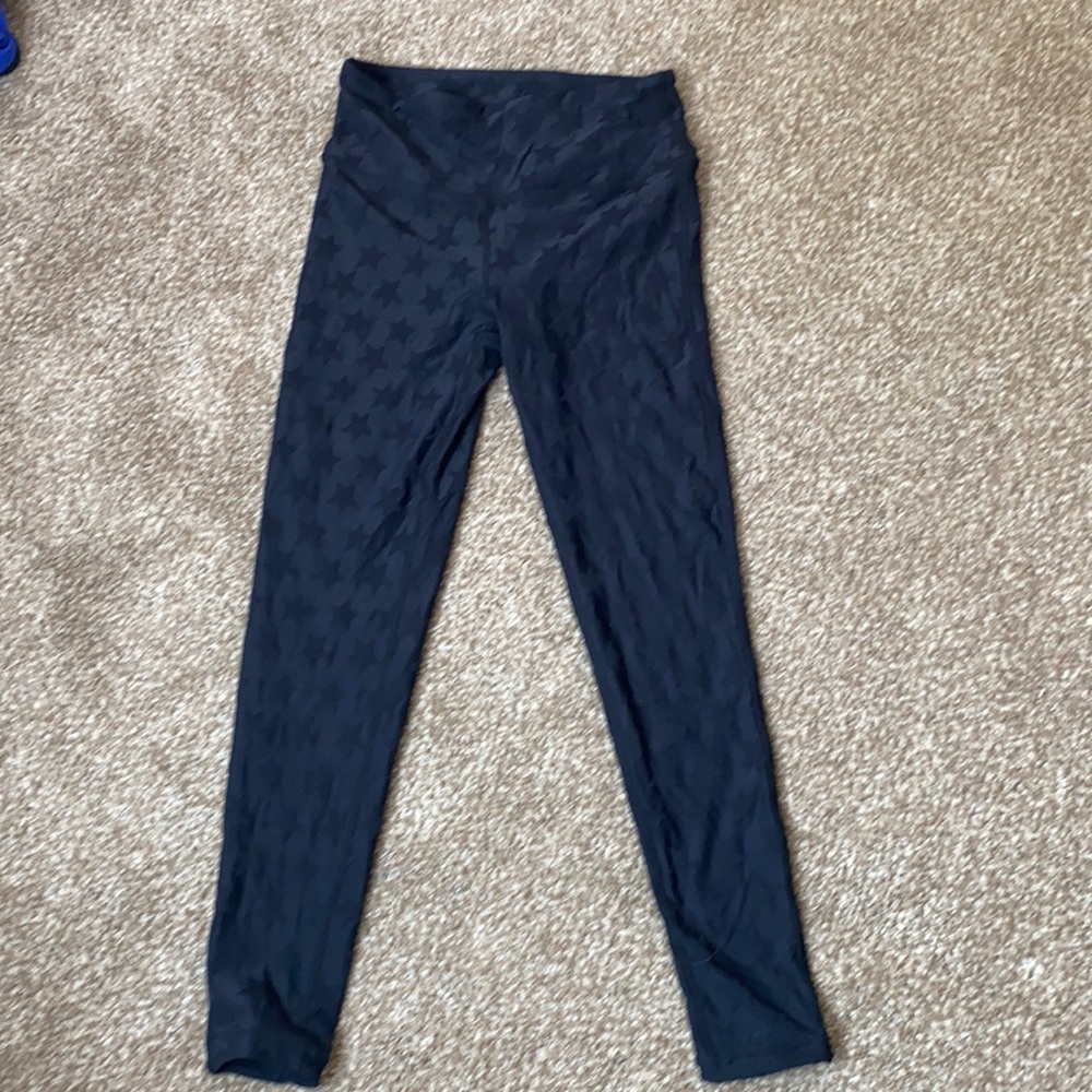 Black textured high waisted black star leggings